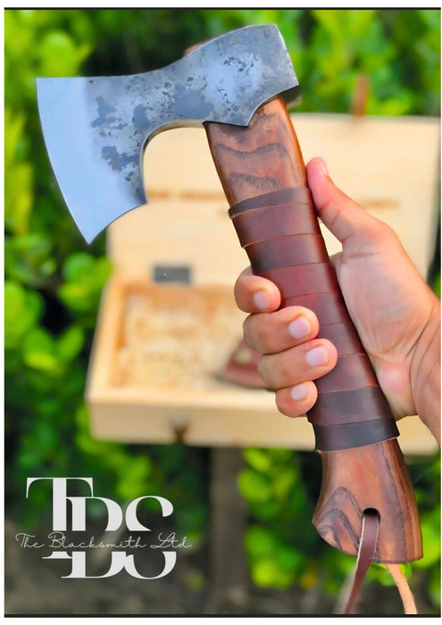 Handmade Damascus Steel Axe with Reddish Maroon Wooden Handle, Thick Round Leather-Wrapped Grip – Premium Bushcraft Tool, Outdoor Adventure Gear, Unique Groomsmen Gift, Rustic Decor - TheBlacksmithLtd #