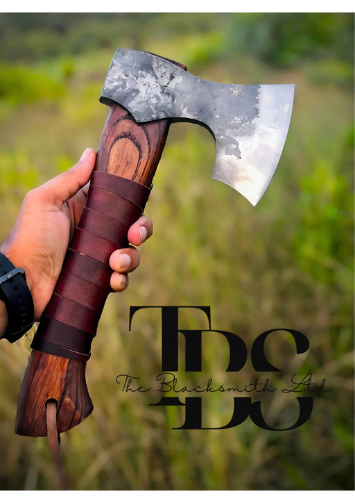 Handmade Damascus Steel Axe with Reddish Maroon Wooden Handle, Thick Round Leather-Wrapped Grip – Premium Bushcraft Tool, Outdoor Adventure Gear, Unique Groomsmen Gift, Rustic Decor - TheBlacksmithLtd #