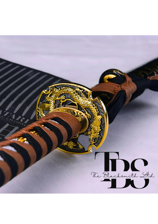 Handcrafted Damascus Steel Katana Sword with Black Blade Cover Featuring Golden Design and Brown Lace, Handle with Black and Brown Threads and Golden Detailing, and Elegant Shiny Sharp Blade – Customizable for Anniversary, Groomsmen Gifts, and Christmas - TheBlacksmithLtd #